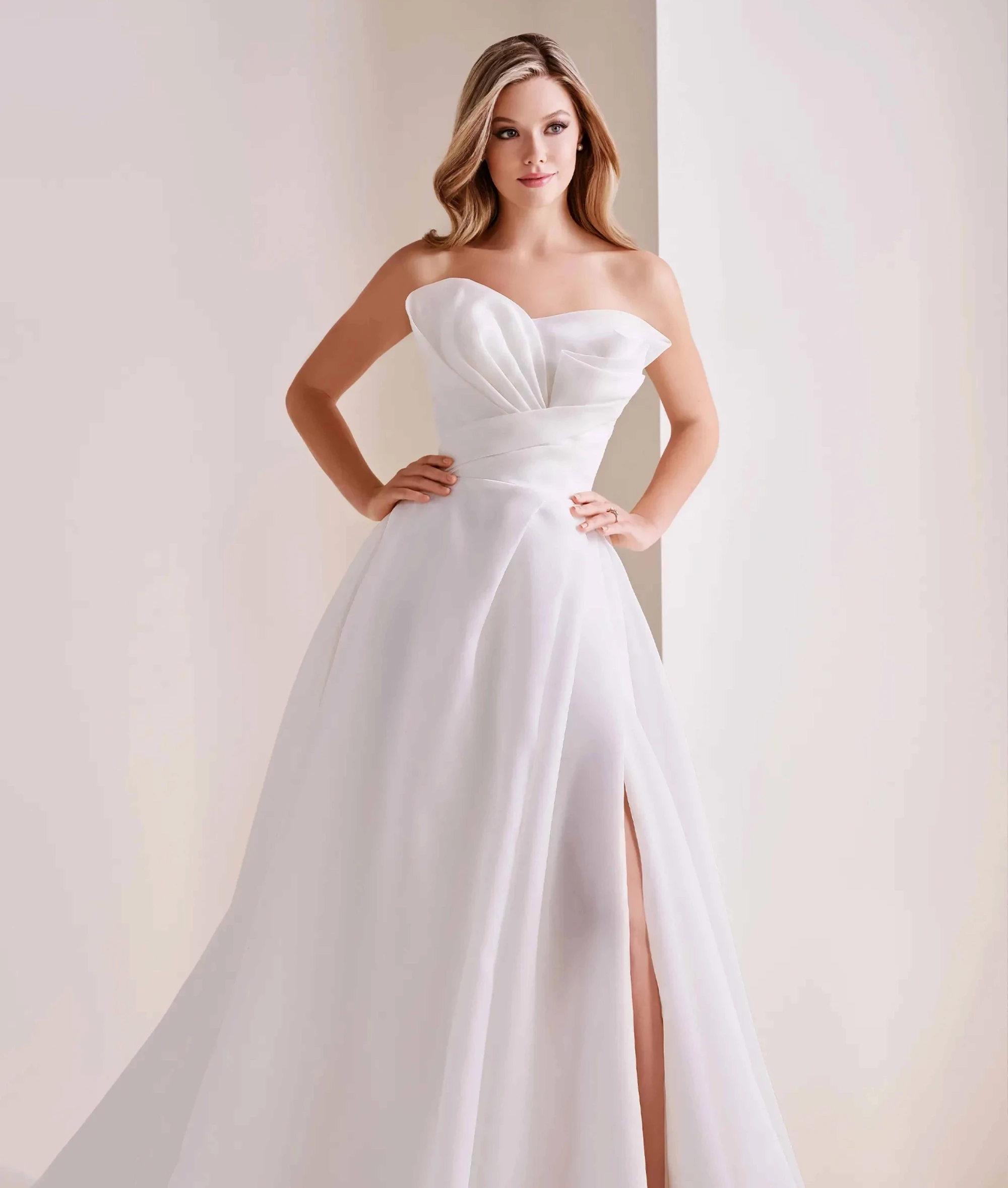 Model wearing a Mon Cheri wedding dress