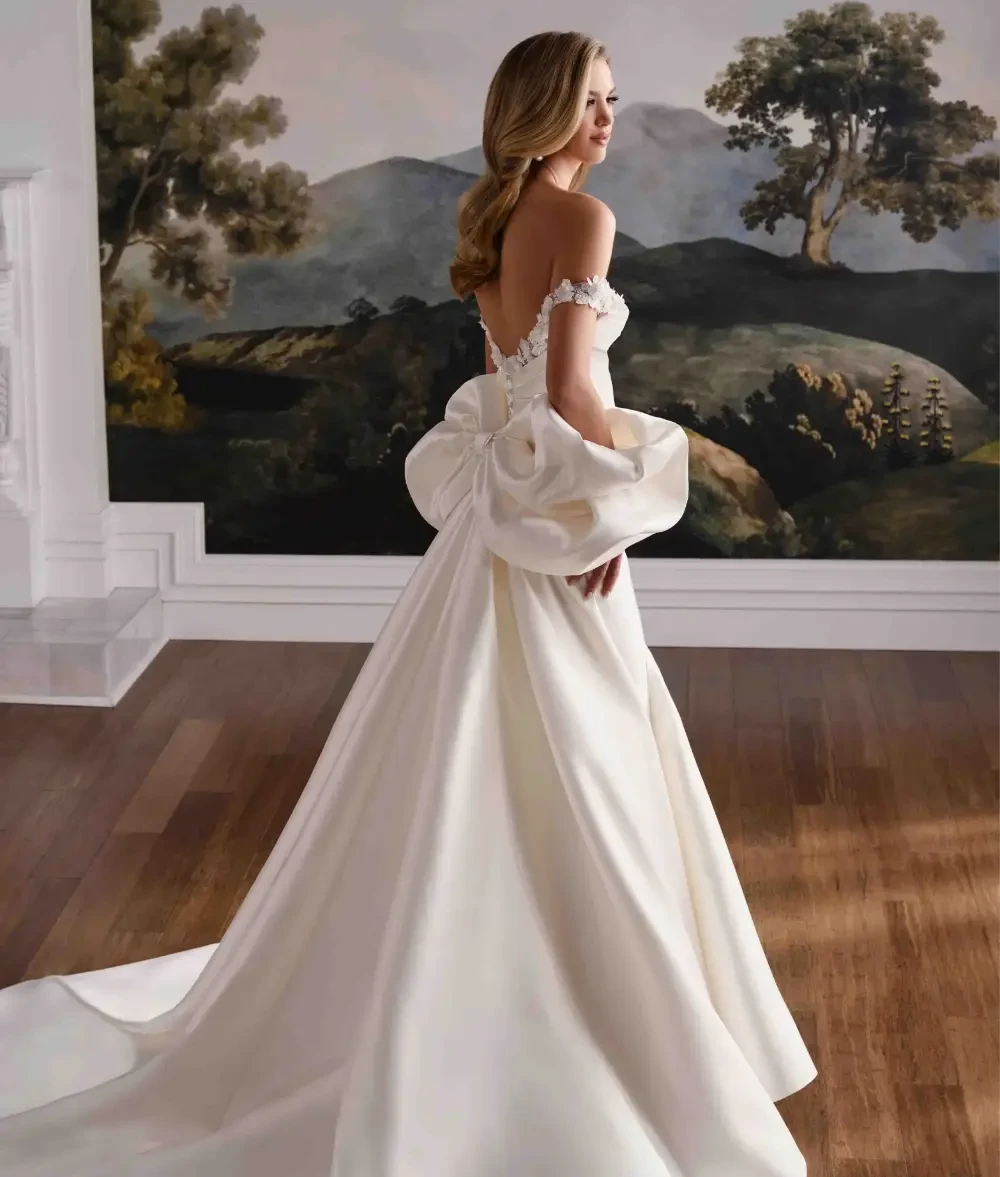 Model wearing a Mon Cheri wedding dress