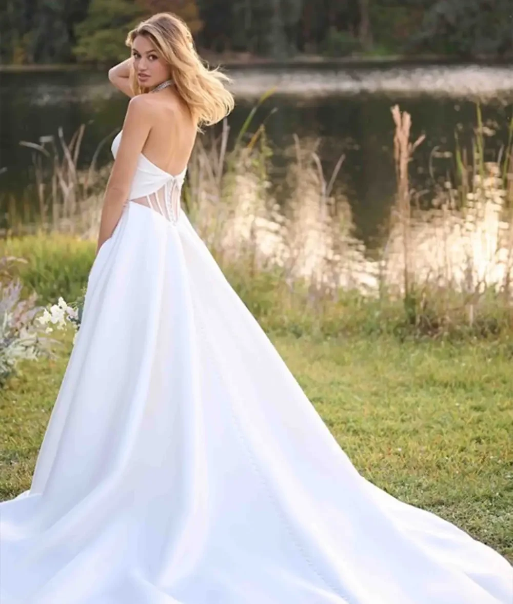 Model wearing a Rebecca Ingram wedding dress