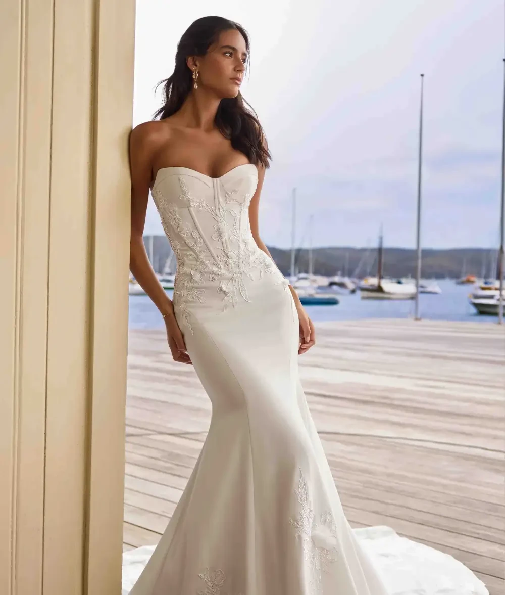 Model wearing a Sophia Tolli wedding dress